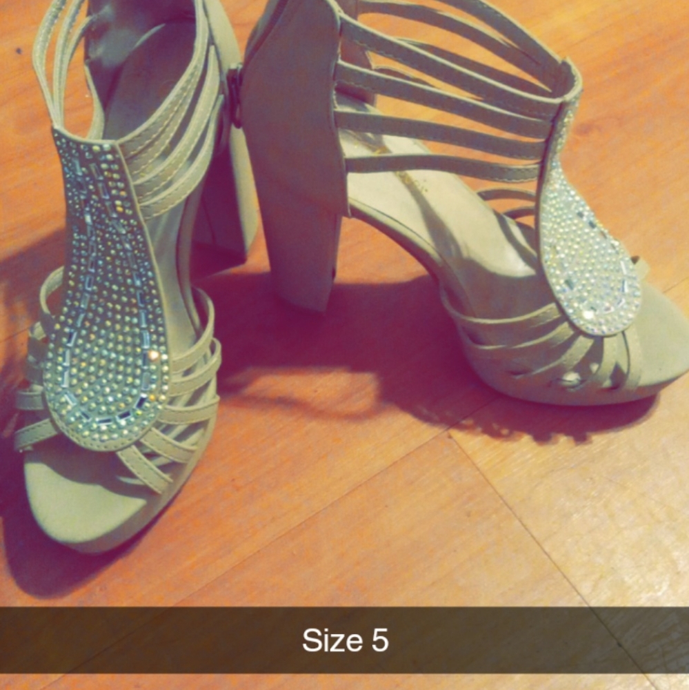 Brand is "Forever" Size 5 color tan with jewls